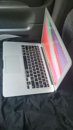 MacBook Air 13 in with charger I can deliver