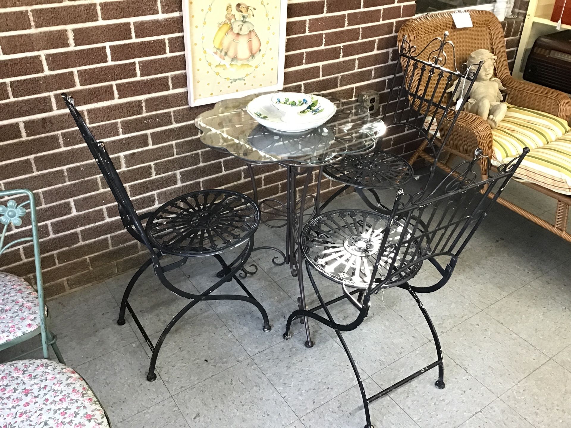 bistro table , three chairs