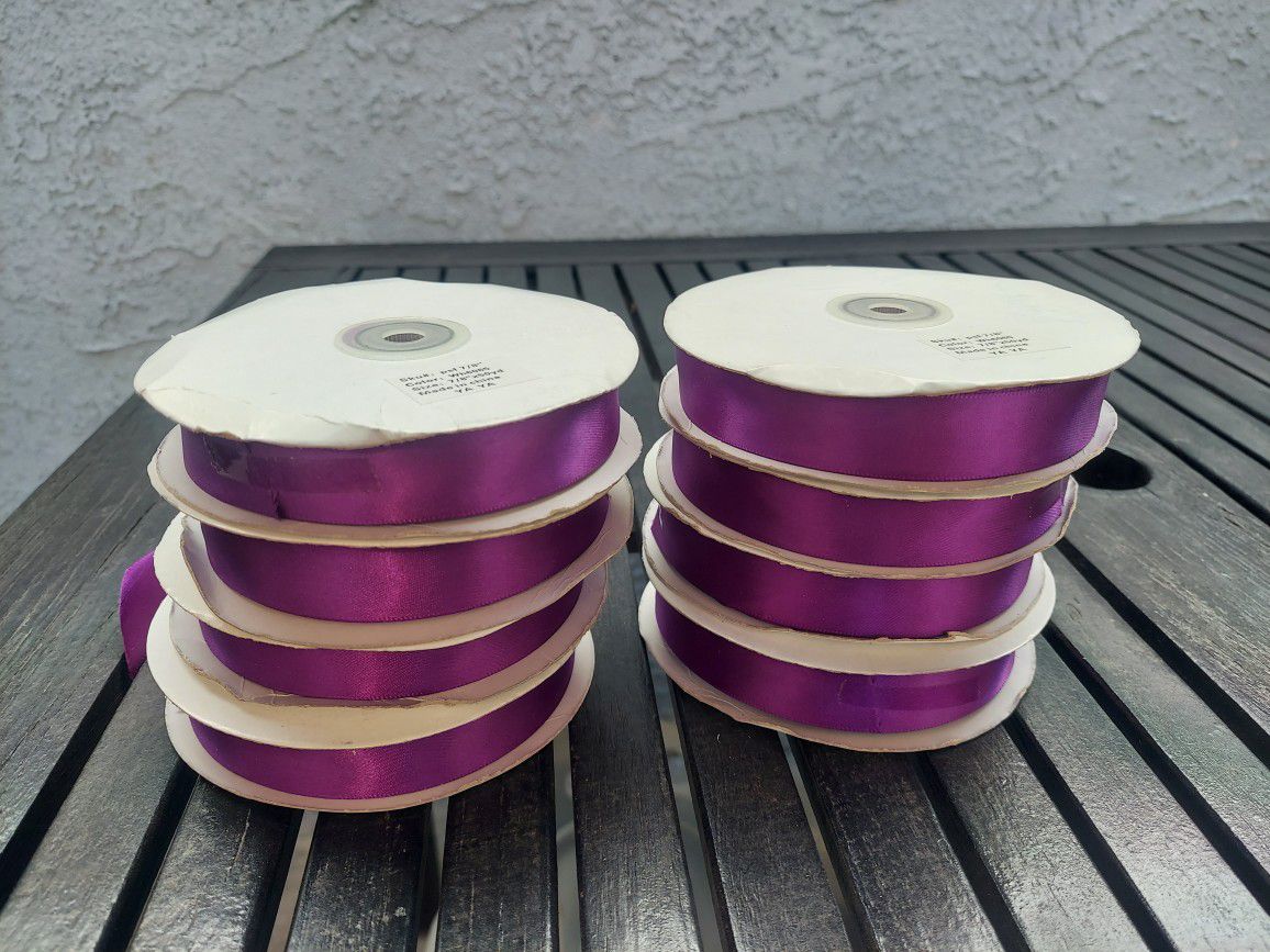 Rolls Of Purple Ribbon And Tulle