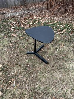 IKEA Svartåsen black laptop stand.