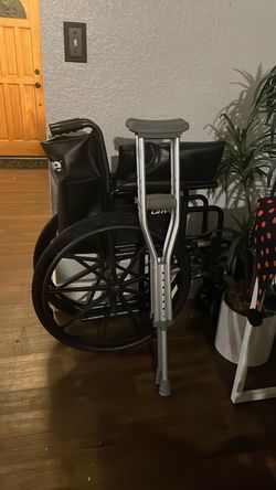 Free Kids wheel chair like new crutches included