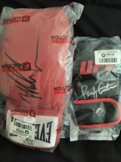 Mike Tyson Autograph glove JSA Authenticated and Randy Couture Autograph glove Beckett Witnessed