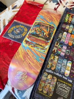 Santa Cruz x Pokemon TCG Skateboard + Grip Tape - Mega Charizard Y