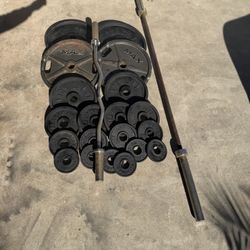 Olympic weight plates 315lbs plus 45lbs bar and curl bar