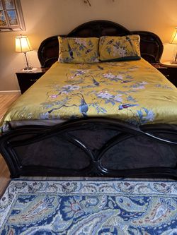 Elegant Italian bed with 2 night stands.