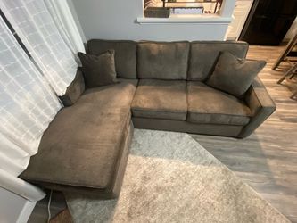 Couch with chaise lounge.