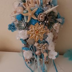 Custom-made seashell wedding bouquet centerpiece