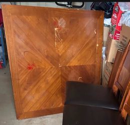 Dining table with 4 padded chairs