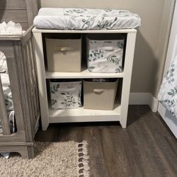 Baby changing table with pad 