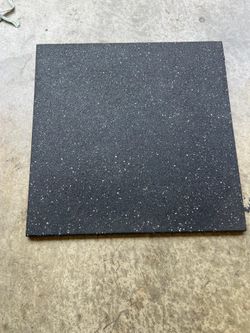 Rubber gym floor tiles