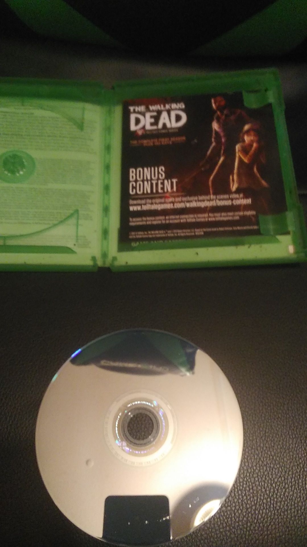 Xbox one the walking dead game. Name writtent on back.