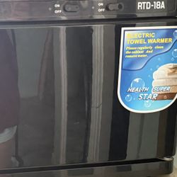 Electric facial towel warmed