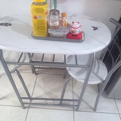 Cute granite breakfast table with chairs 