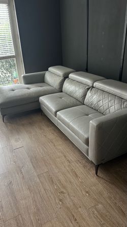 Gray Leather Sectional Couch with Storage Ottoman