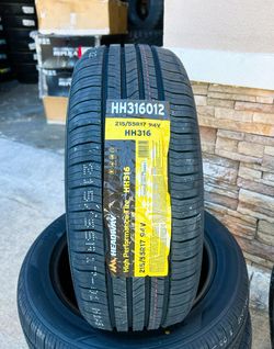 Set of four (4) P2155517 Headway tires with free install mount & balance 215-55-17