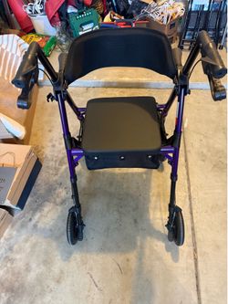 Brand new foldable Rollator Walker for Seniors with seat.