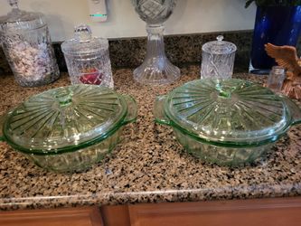 Casserole dishes, brand new glass green, never been used to piece set of two of the casserole dishes is eighty dollars