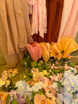 Faux fake flowers and sashes for party decorations