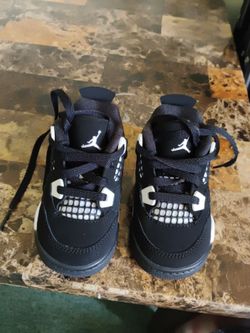 Baby Nike jordans.white and black. Smoke free pet free environment.