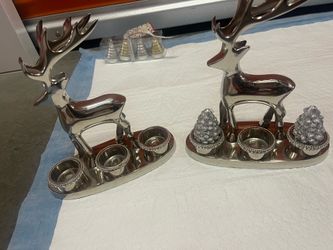 2 reindeer Christmas candle holder both $20