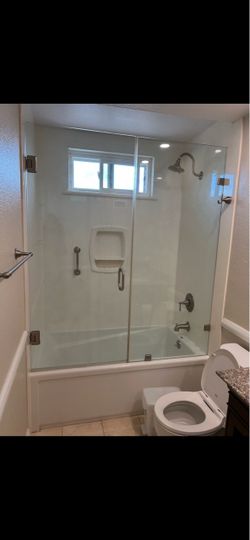 Bath tub shower door