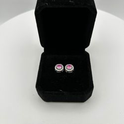 Diamond halo earrings .5 Carat Each 