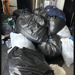 14 bags of almost all woman’s clothes