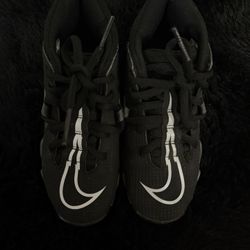 Nike Alpha cleats 