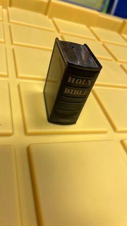 vintage "Holy Bible" coin bank