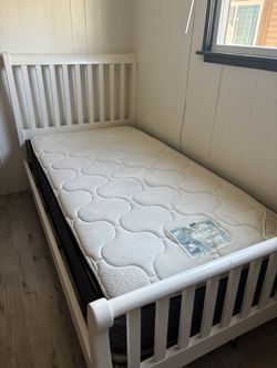 Twin bed frame with mattress