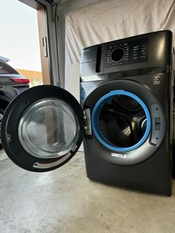 GE PROFILE™ ENERGY STAR® 4.8 CU. FT. CAPACITY ULTRAFAST COMBO WITH VENTLESS INVERTER HEAT PUMP TECHNOLOGY WASHER/DRYER