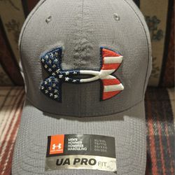 NEW  UNDER ARMOUR  GREY  PATRIOTIC EMBRODERY  LOGO ADULT ( XL/XXL SIZE)  FITTED  HAT /CAP