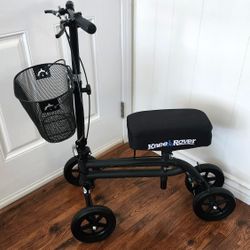 KNEEROVER KNEE SCOOTER/WALKER. PAD COVER. FRONT BASKET. DUAL BRAKES. ADJUSTABLE. FOLDABLE.  EXCELLENT CONDITION!