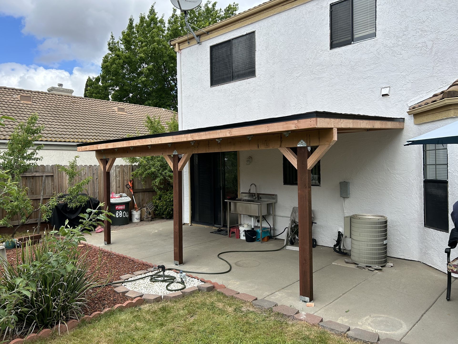 CUSTOM SHEDS AND PATIOS COVERS