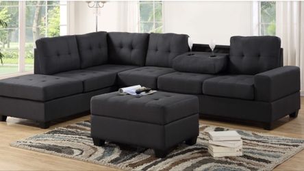 New dark gray sectional with storage ottoman