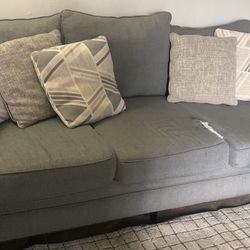 Couch, Loveseat, And Rug