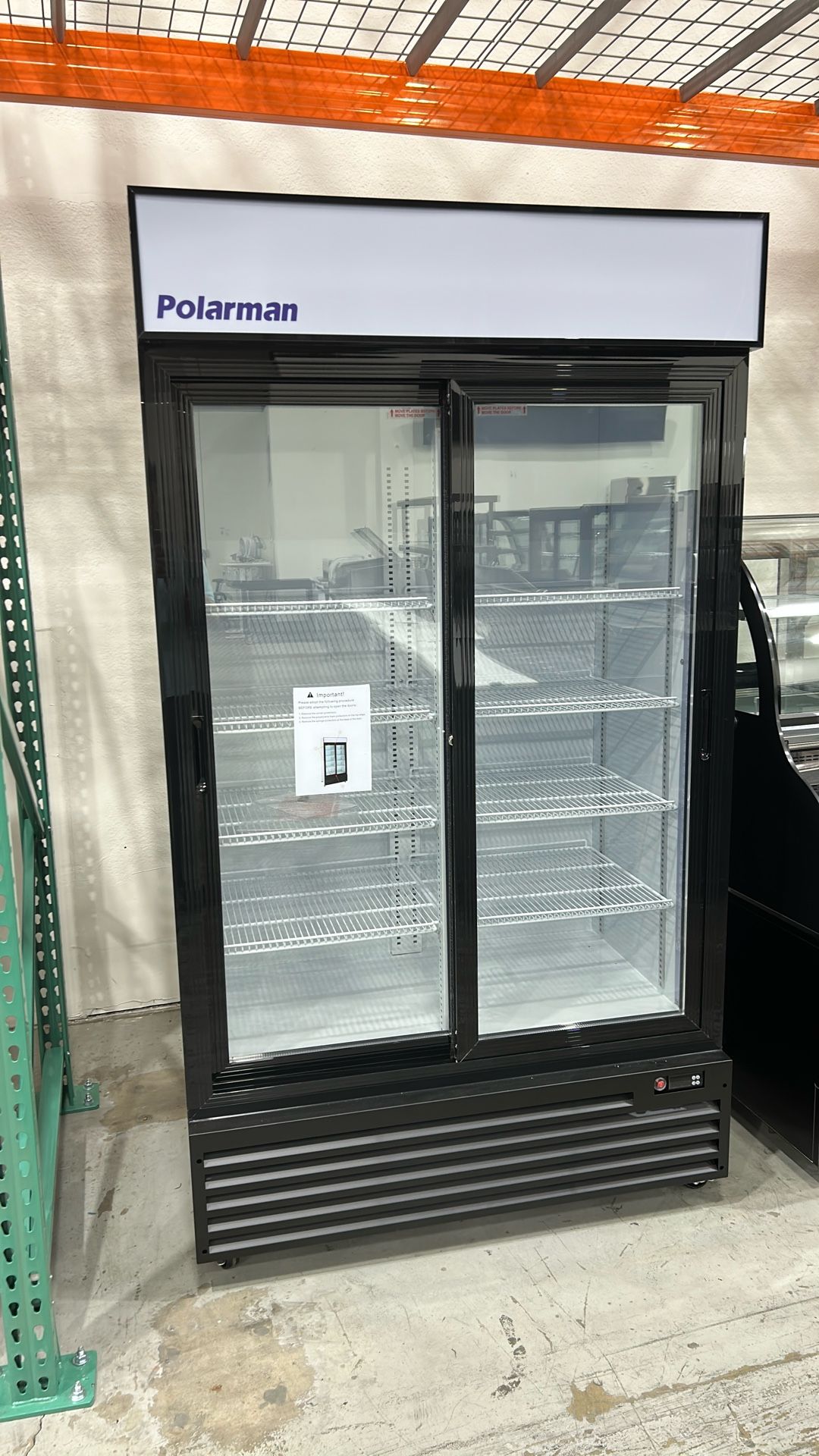 44 1/2" Merchandiser Refrigerator Cooler – Polarman SS-P1000WB-B Black Exterior, Sliding Glass Door 