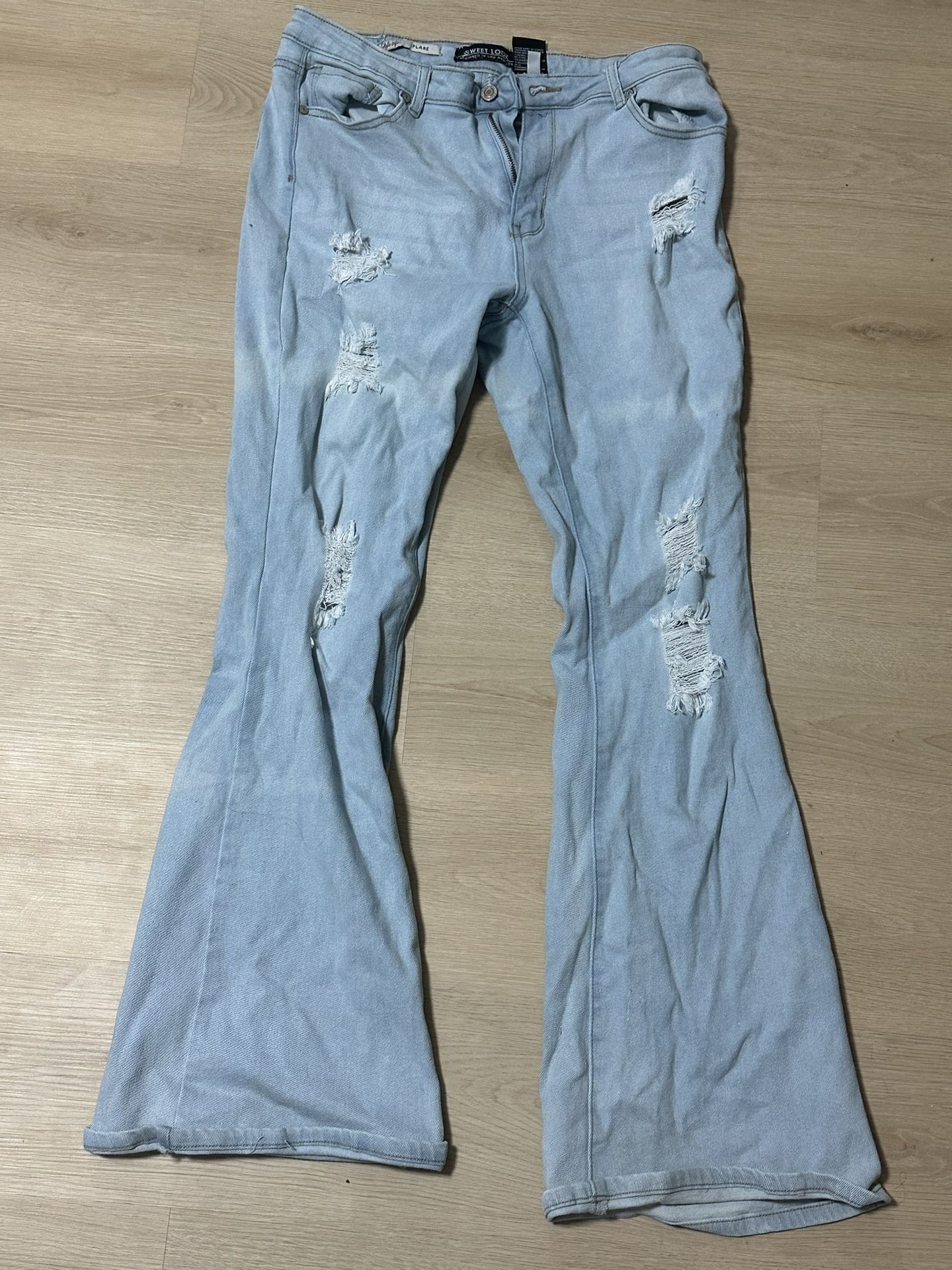 flare light wash ripped jeans