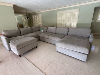 Kevin Charles L shaped great fabric couch plus ottoman