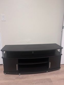 Dark brown TV stand with cabinets Dark brown TV stand with cabinets
