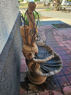 Concrete lady fountain