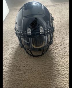 Riddell Revolution F7 football helmet Adult Medium (M) Used, good condition. Normal wear from play. Clear visor and black facemask included. No cracks