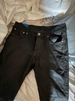 black tag purple jeans