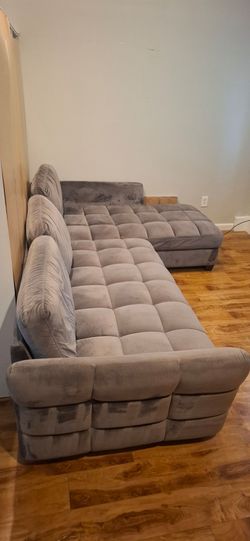 L-shaped velvet sofa. Delivery available.