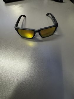 Premium Oakley Holbrook Sunglasses - Matte Black Camo with 24K Iridium Lenses Elevate your everyday eyewear with this iconic pair of Oakley Holbrook s