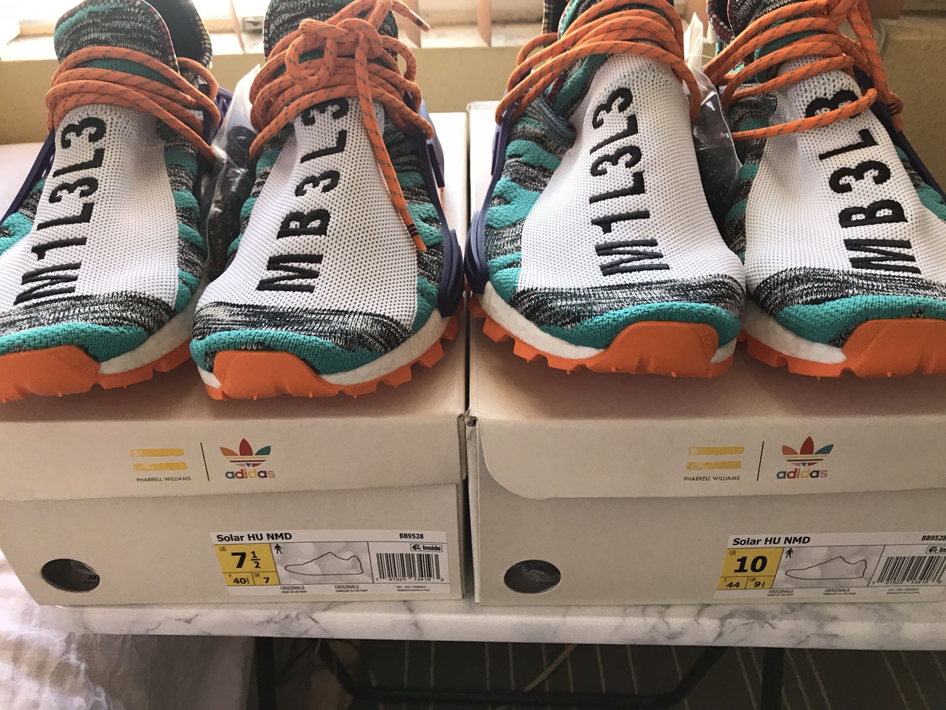 Adidas NMD HU Pharrell Solar Pack Orange 🍊Sz 1/2 and 10 $300 each