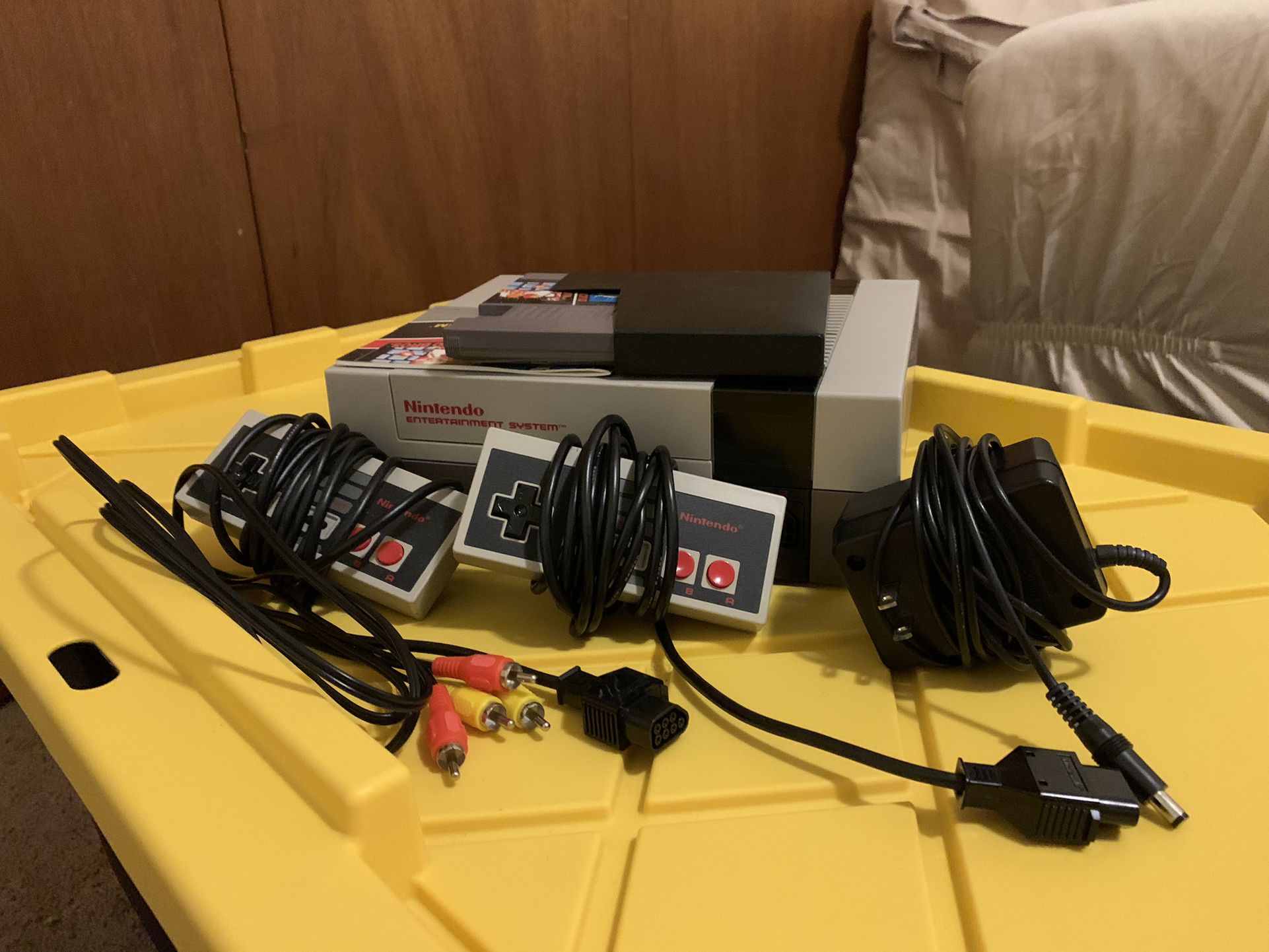 Fully Working Original N.E.S. (Nintendo Entertainment System) With 2 Controllers, A 2 in 1 Game, and all Required Cords.