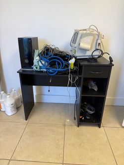 A computer desk with monitor, etc. For free. Please come pick them up!!!