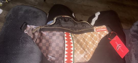 Spray ground crossover bag