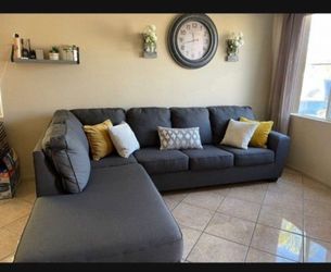 Beautiful charcoal grey sectional couch from Living Spaces LIKE NEW